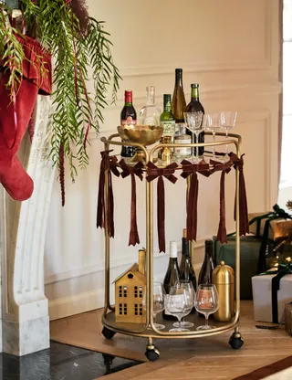 bar cart with bow garland