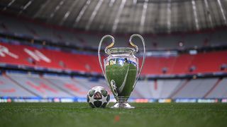 The official match ball is seen with the Champions League trophy ahead of the UEFA Champions League Final 2025 between Paris Saint-Germain and FC Internazionale Milano at the Munich Football Arena on May 28, 2025 in Munich, Germany.