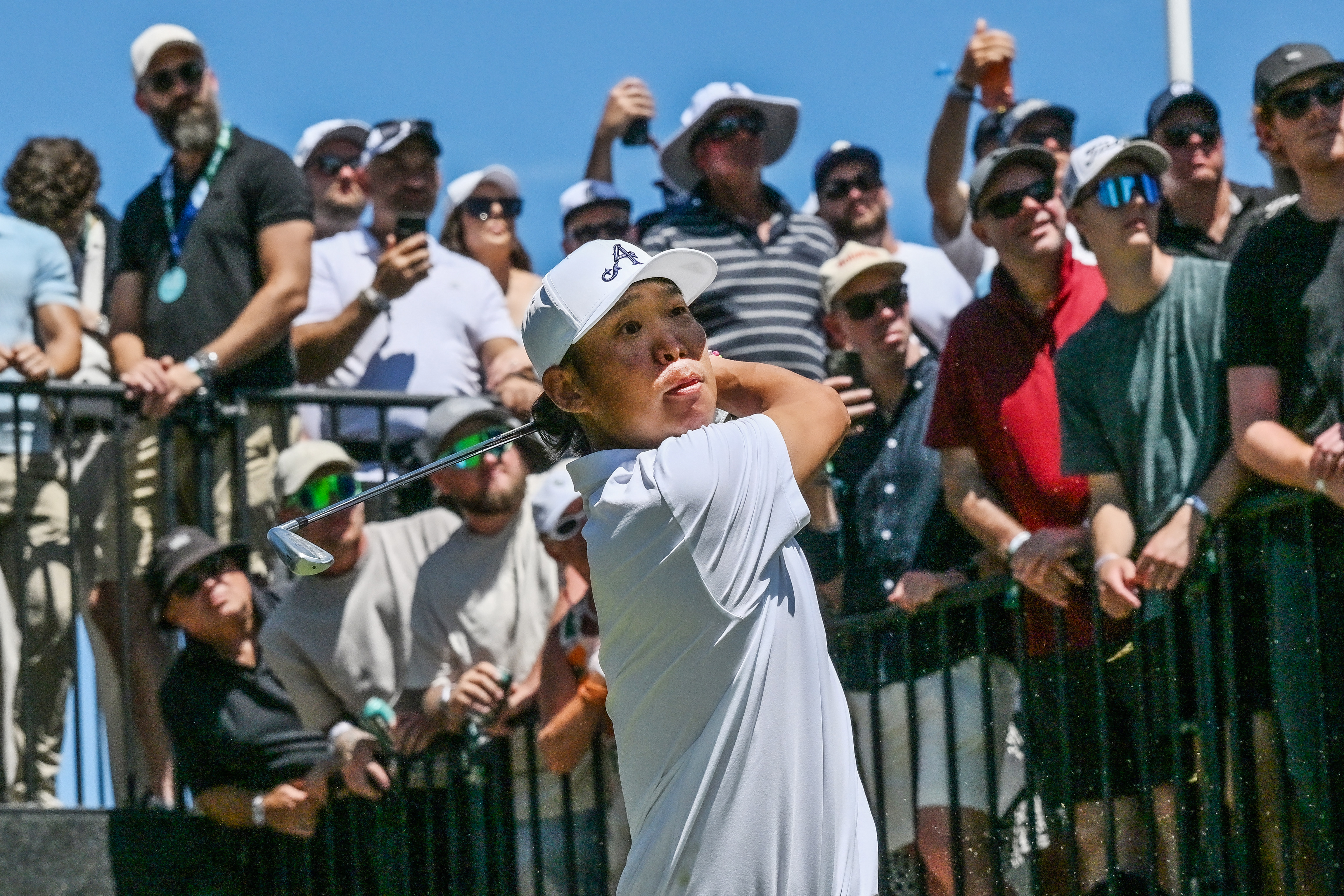 Anthony Kim hits an iron shot