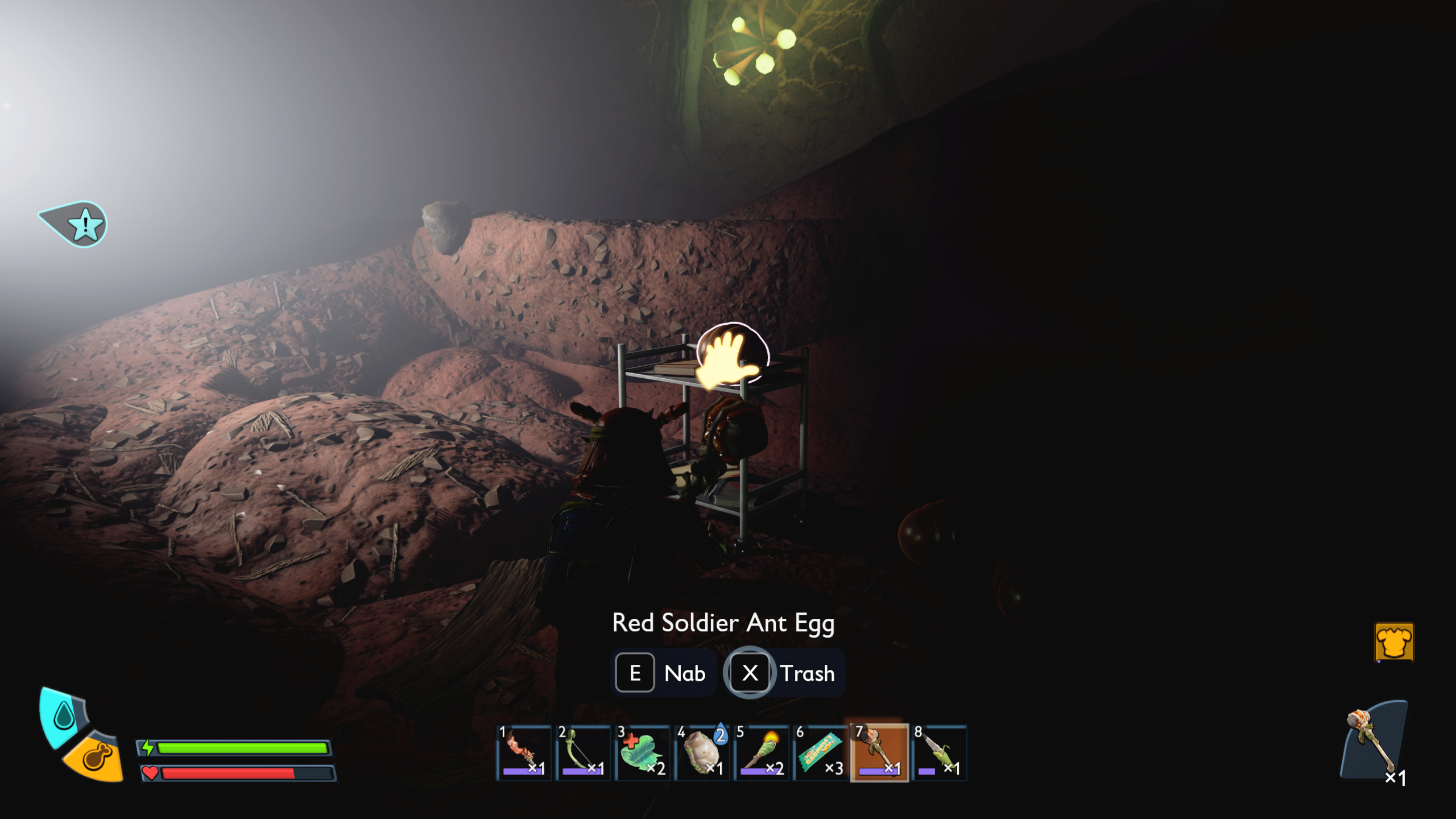 Grounded 2 red soldier ant egg location Egg Hunt: A red soldier ant egg on a metal table inside a dark cave.