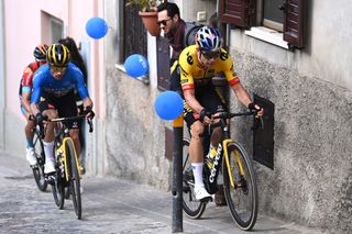 Wout van Aert cuts inside a bollard during stage 6 of Tirreno-Adriatico to find some smooth surface