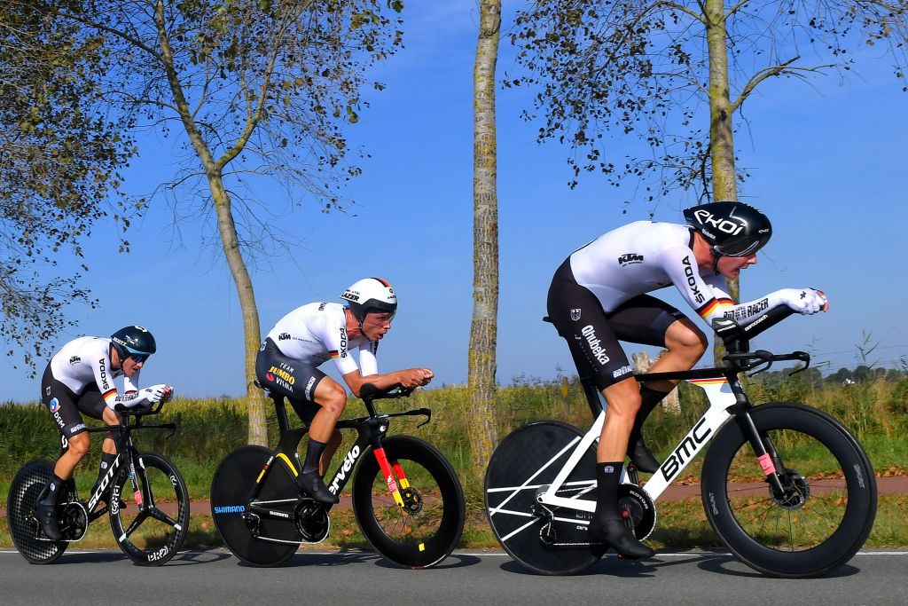BRUGES BELGIUM SEPTEMBER 22 LR Nikias Arndt of Germany Tony Martin of Germany and Max Walscheid of Germany sprint during the 94th UCI Road World Championships 2021 Team Time Trial Mixed Relay a 445km race from KnokkeHeist to Bruges flanders2021 TT on September 22 2021 in Bruges Belgium Photo by Luc ClaessenGetty Images