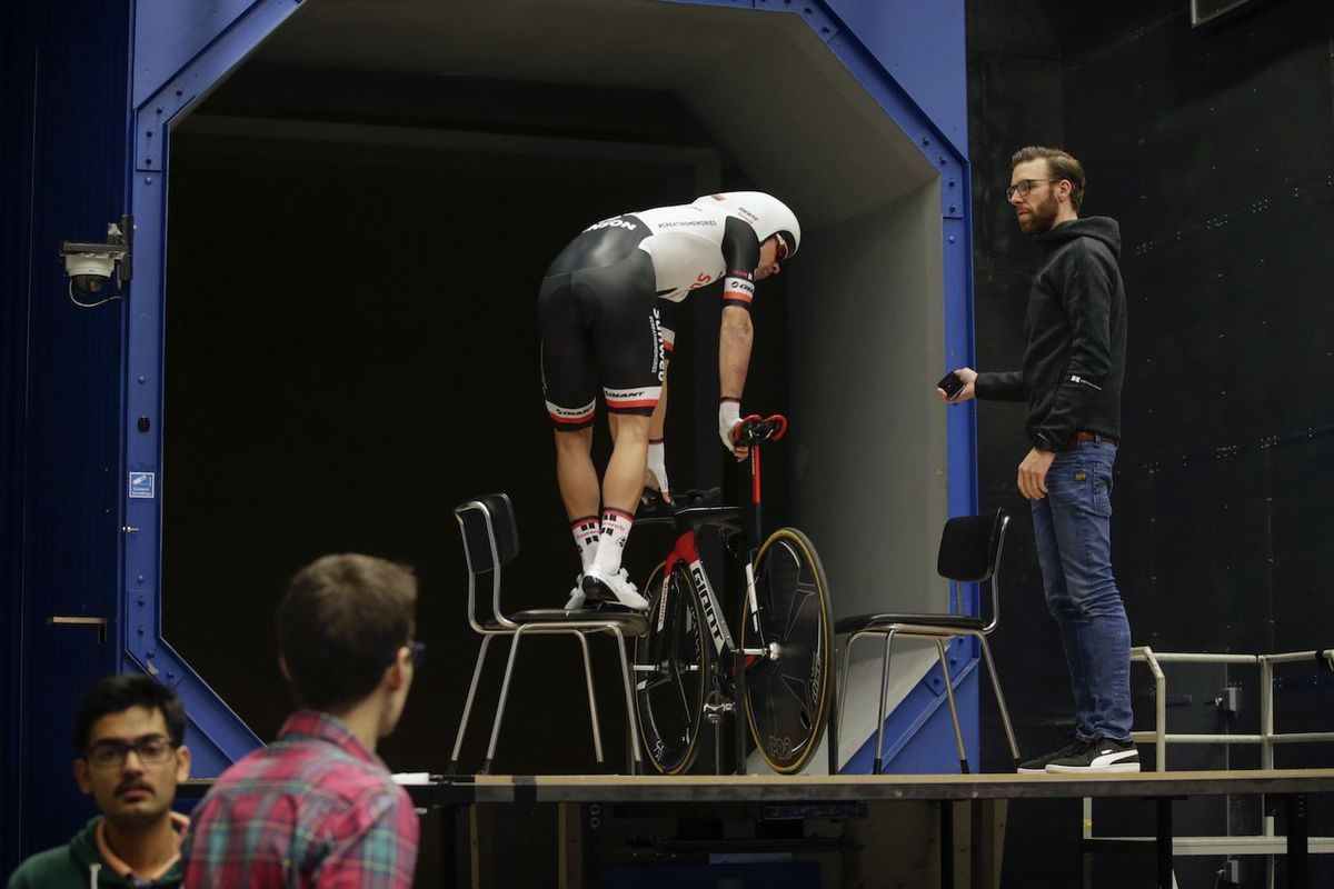 Michael Matthews climbs aboard his bike at the wind tunnel