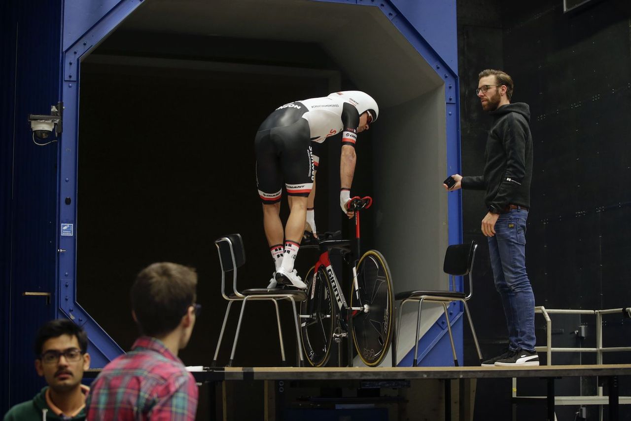 Michael Matthews climbs aboard his bike at the wind tunnel