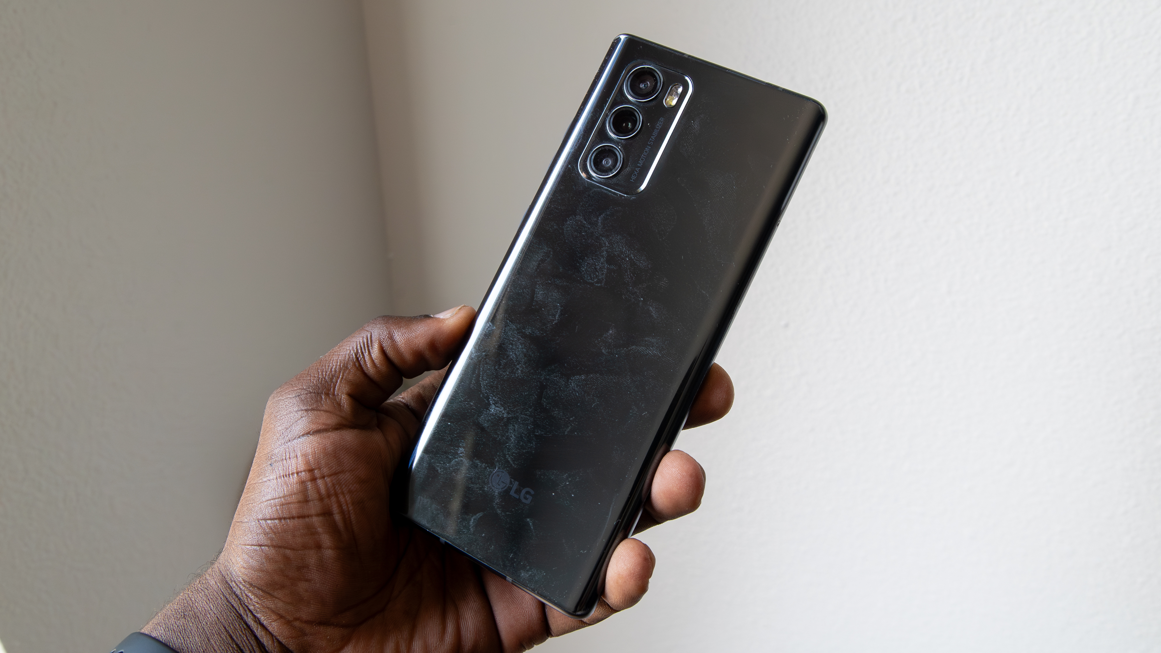 The LG Wing with fingerprints all over its back glass panel