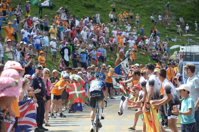 Andrew Talansky (Garmin-Sharp) climbs amidst a sea of Basque fans