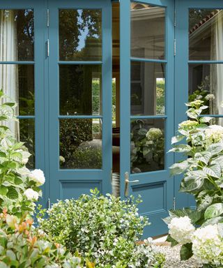 Summer door decor with blue painted french doors