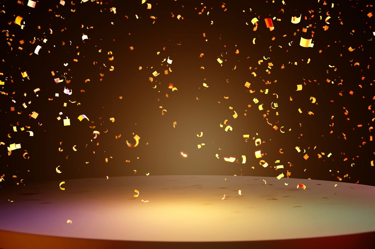 Festive podium on dark background with many flying golden confetti.