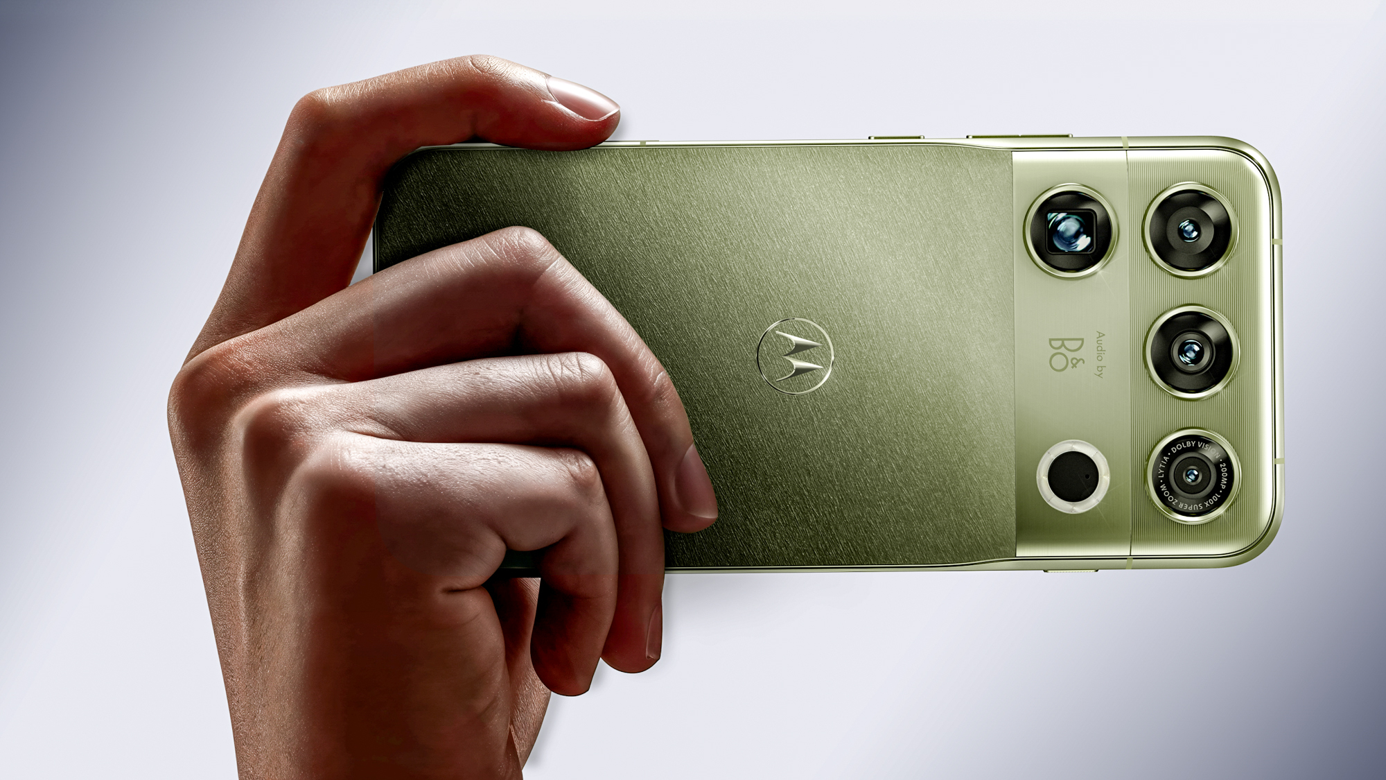 Motorola Signature 27 held in the hand.
