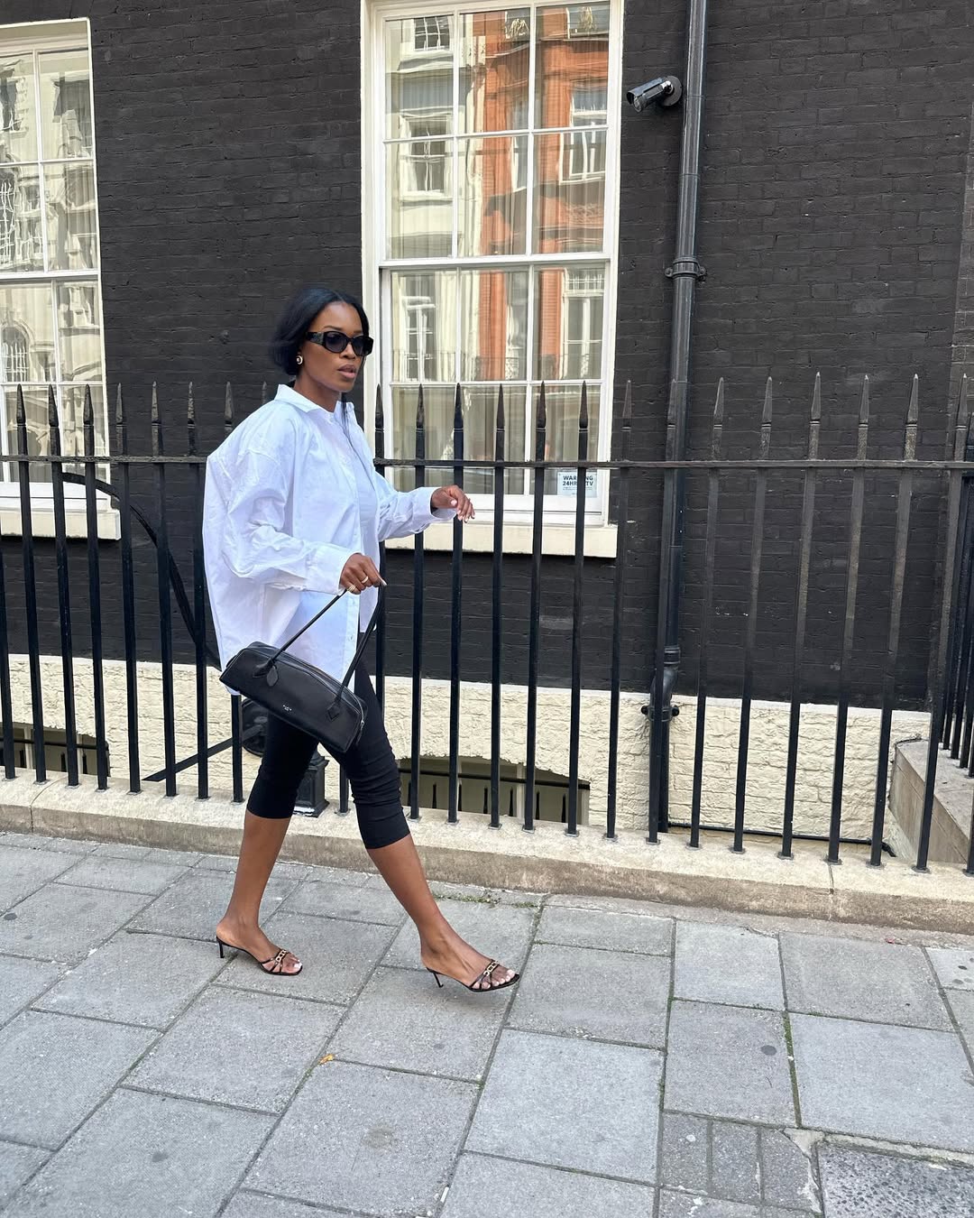 Marilyn in capri leggings and white shirt