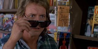 They Live Roddy Piper looking amazed with his special sunglasses