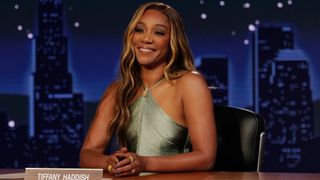 Tiffany Haddish sits at her desk on Jimmy Kimmel Live!