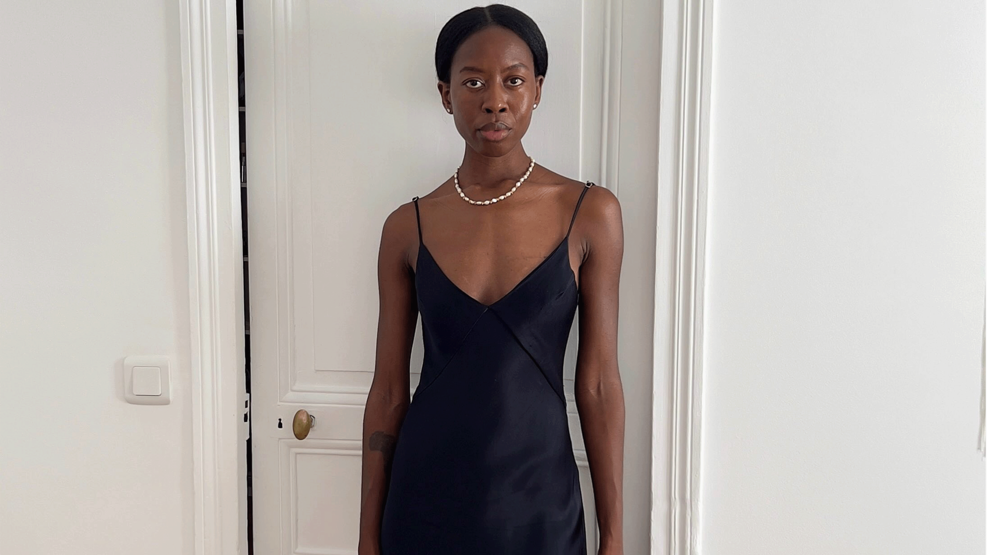 Sylvie Mus wearing a slip dress.