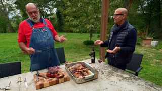 Stanley Tucci talks with a chef in Stanley Tucci: Searching for Italy