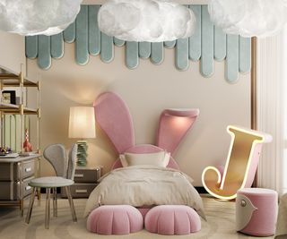 child's bedroom with pink rabbit bed design, large J letter light and cloud effect pendant lighting