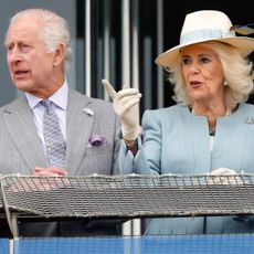 King Charles III and Queen Camilla watch the racing as they attend 'Ladies Day' of the Betfred Derby Festival 2024 at Epsom Downs Racecourse on May 31, 2024 in Epsom, England.