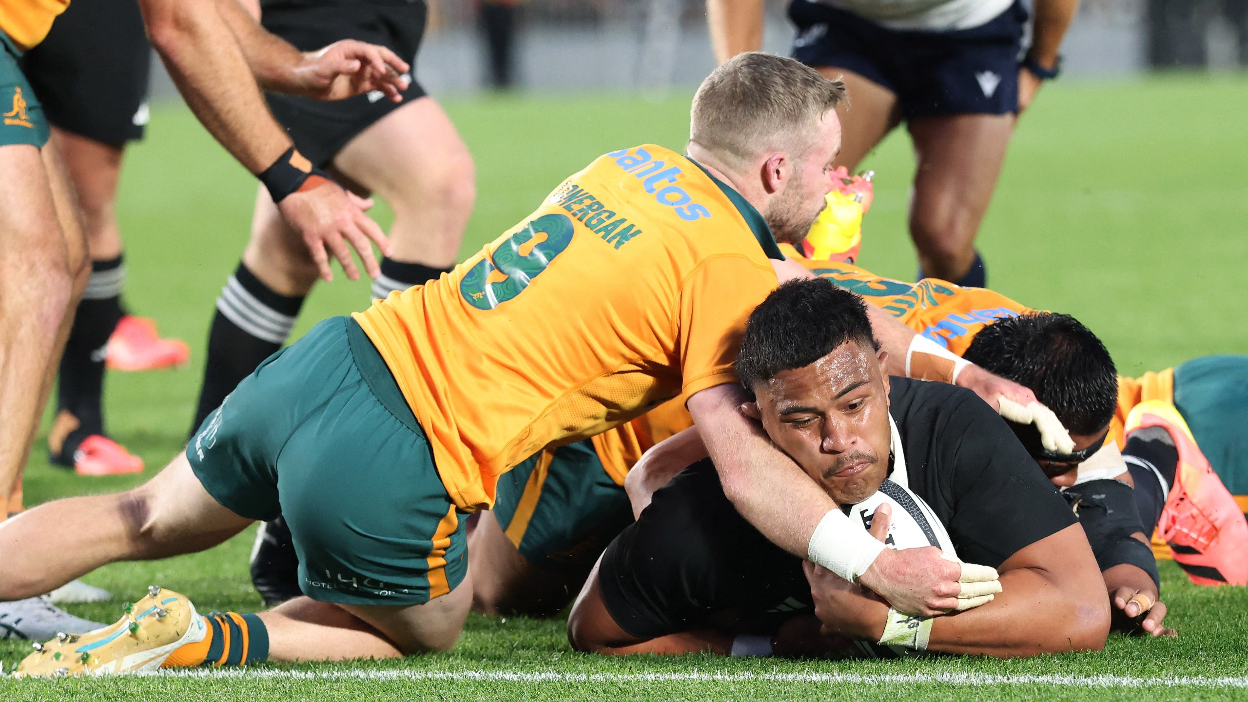 Tupou Vaa'i (bottom C) of New Zealand dives in for a try during the rugby union Bledisloe Cup match between New Zealand and Australia at Eden Park in Auckland on October 10, 2026