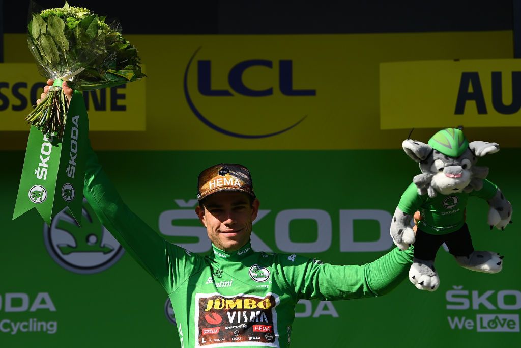 CARCASSONNE FRANCE JULY 17 Wout Van Aert of Belgium and Team Jumbo Visma celebrates winning the Green Points Jersey on the podium ceremony after the 109th Tour de France 2022 Stage 15 a km stage from Rodez to Carcassonne TDF2022 WorldTour on July 17 2022 in Carcassonne France Photo by Tim de WaeleGetty Images
