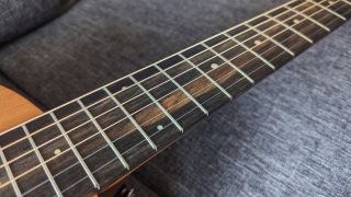 The Ebony fingerboard on a Sheeran by Lowden W05 acoustic guitar