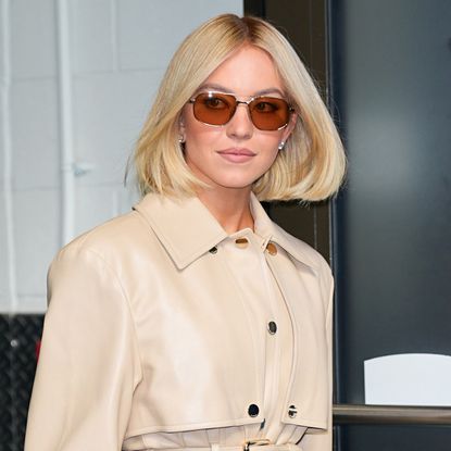 Sydney Sweeney wore a trench coat with the celebrity-beloved Miu Miu Aventure bag