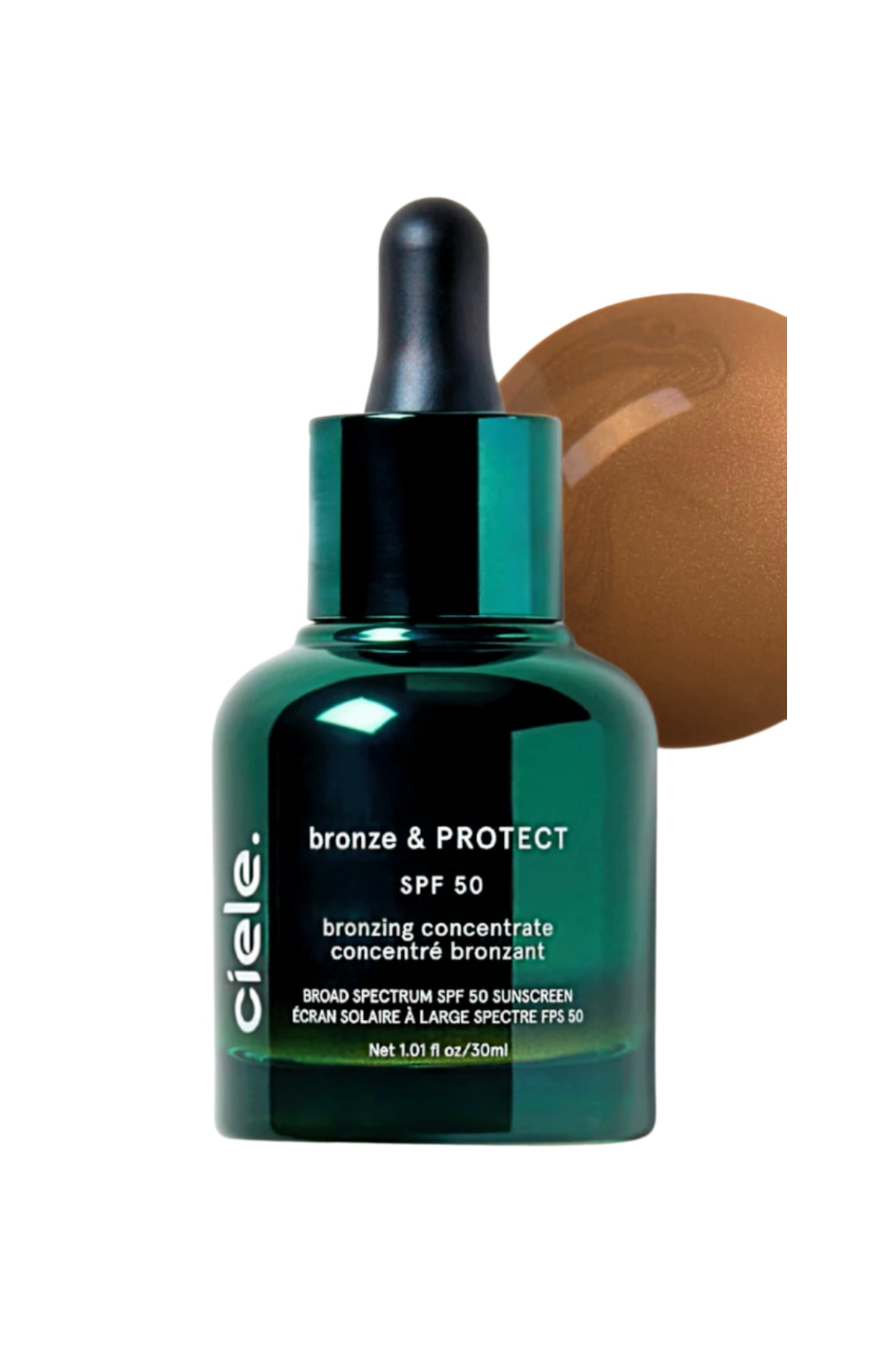 a shiny green bottle of bronzer