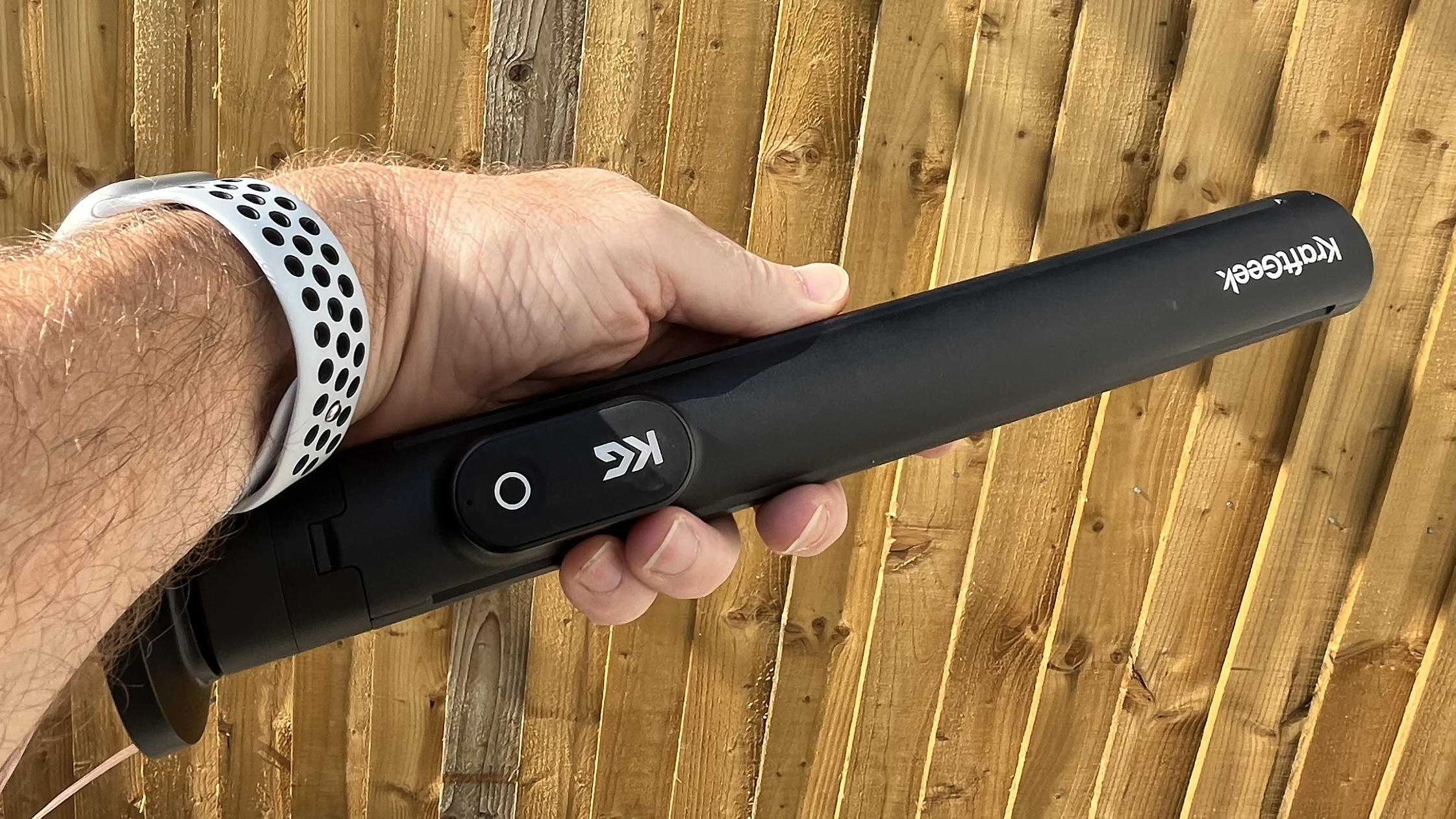 KraftGeek JustTap Magnetic Phone Tripod closed up in hand