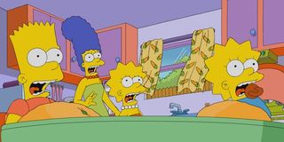 the simpsons family shocked at kitchen table