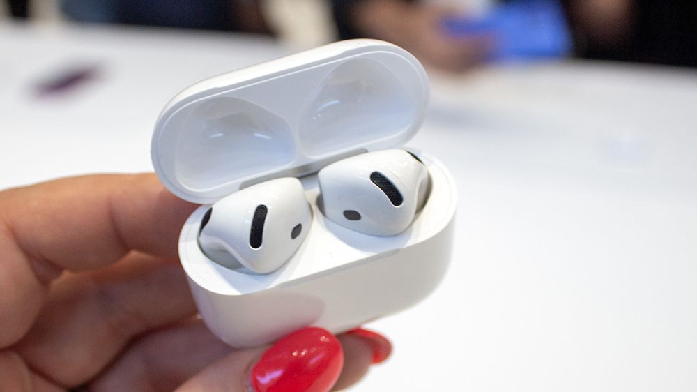 A close-up of the AirPods 4 in their open case