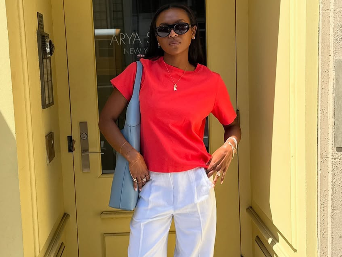 woman wearing ballet flats with white pants summer 2025