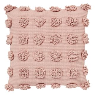 cushion on pink color with woven
