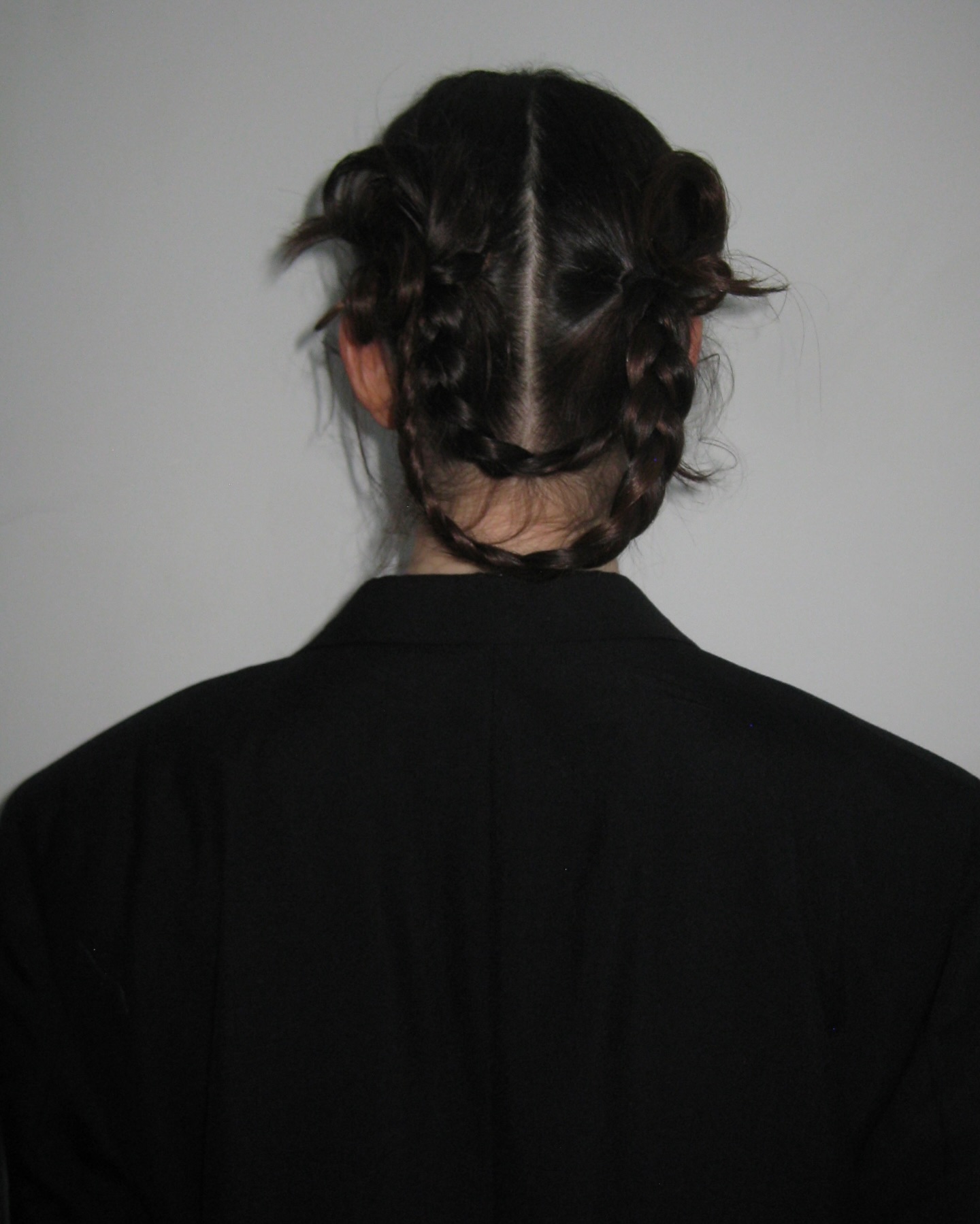 Lilli Kay with double braid twisted hairstyle
