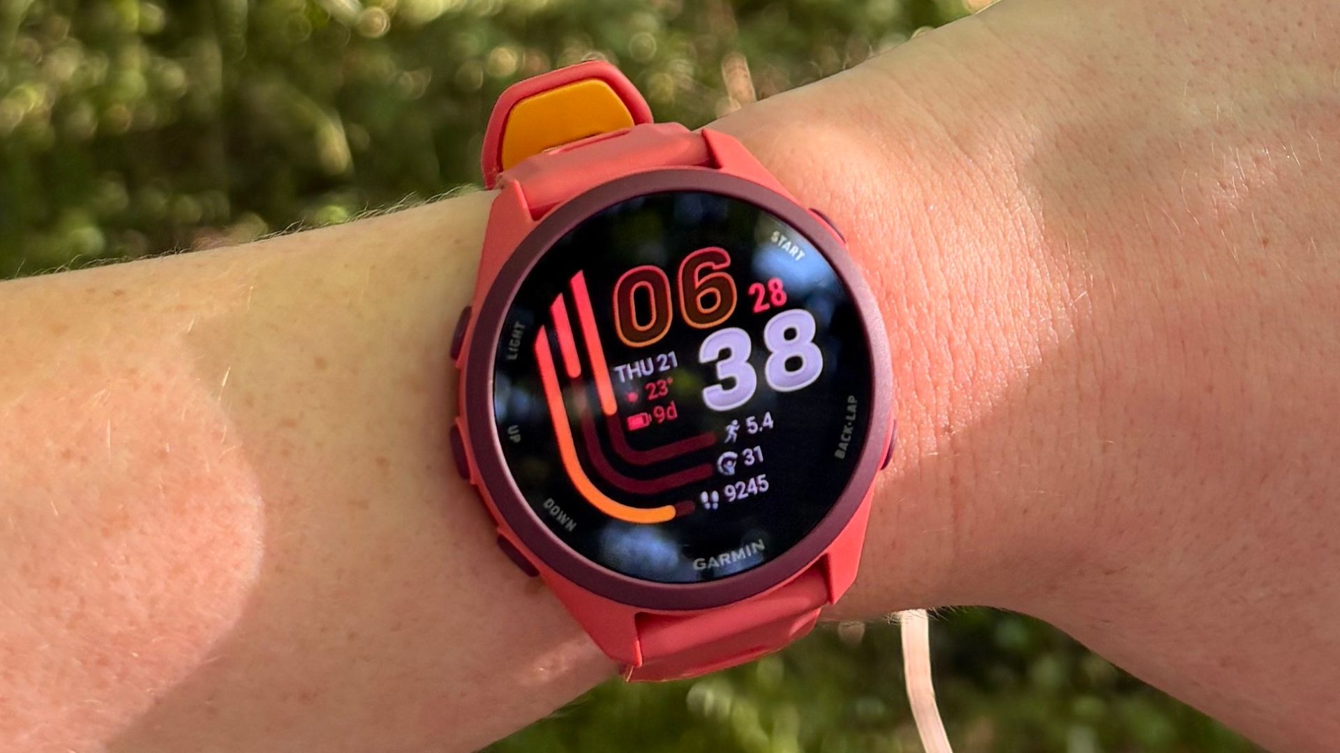Grace Walsh wearing the Garmin Forerunner 170 Music on wrist during run