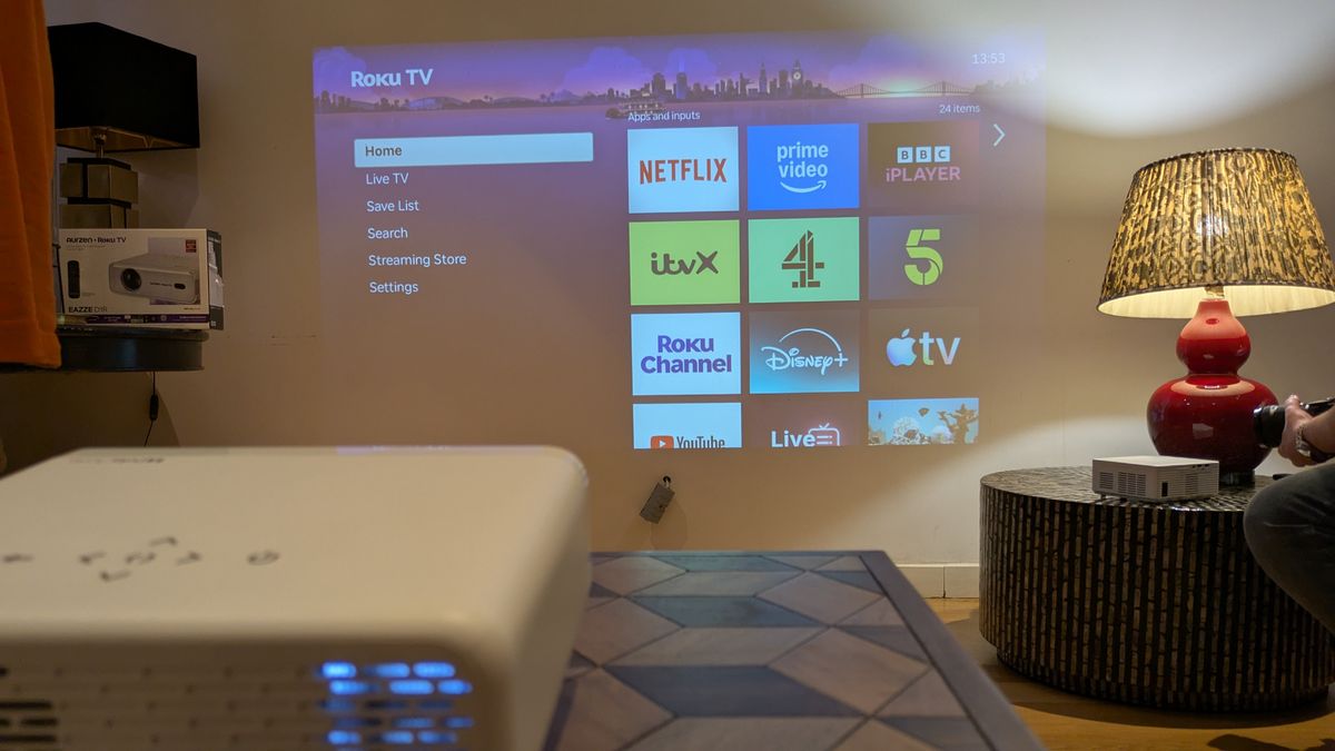 Roku Aurzen projector projecting home screen onto wall