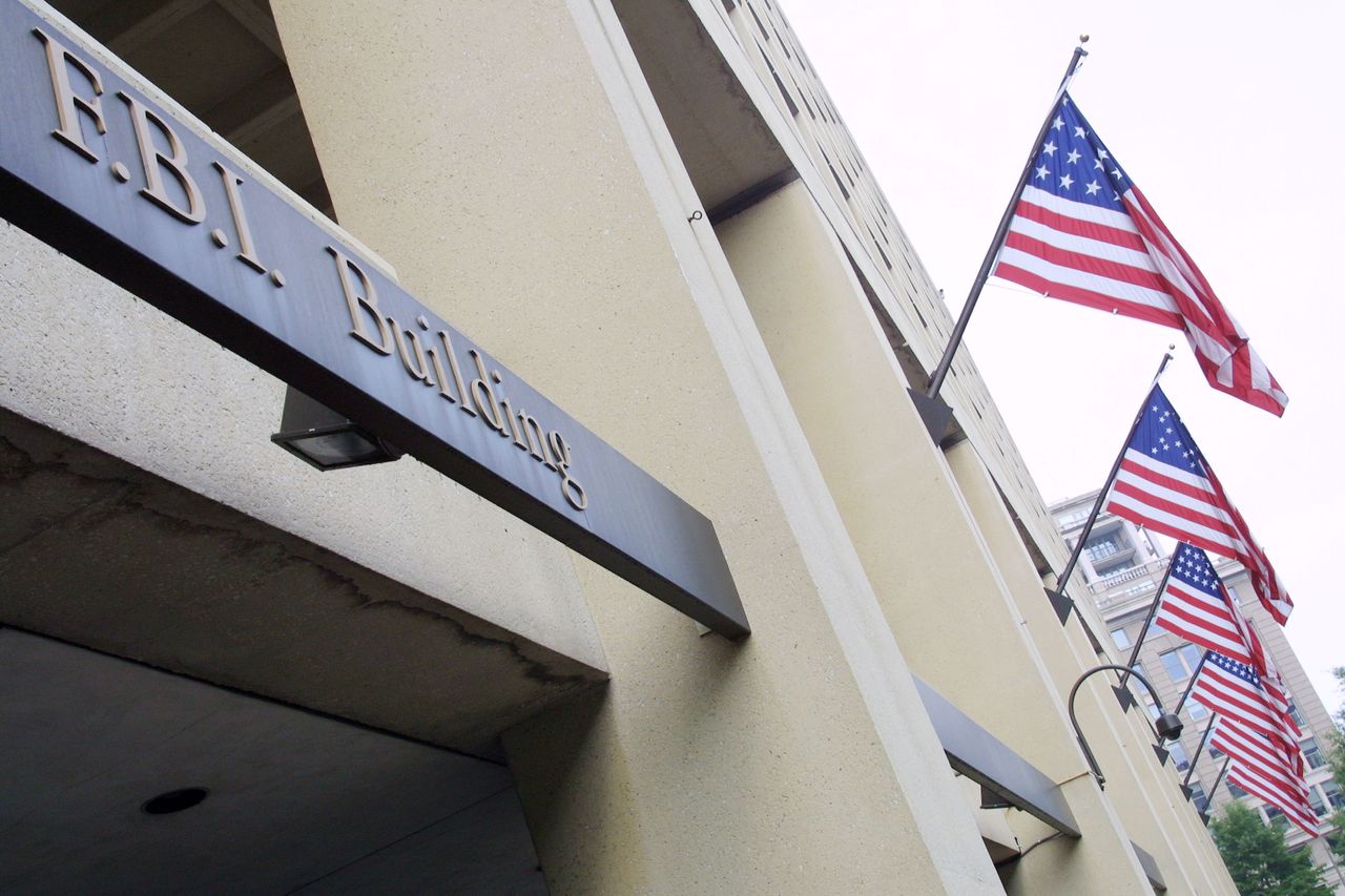 FBI building with American flags.