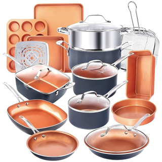 20 piece ceramic cookware set for kitchen, including pots, frying pans and baking equipment in navy, copper and chrome colors