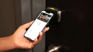 A digital Hyatt keycard being used to unlock a room