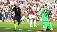 Man City striker Sergio Aguero celebrates his winning goal against Burnley at Turf Moor