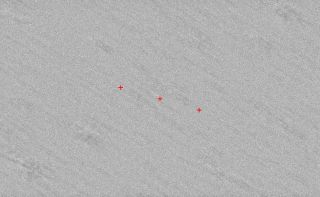 The area in the sky where astronomers would have spotted the asteroid 2006 QV89 if it was on a collision course with Earth, with the three crosses marking the specific locations. 