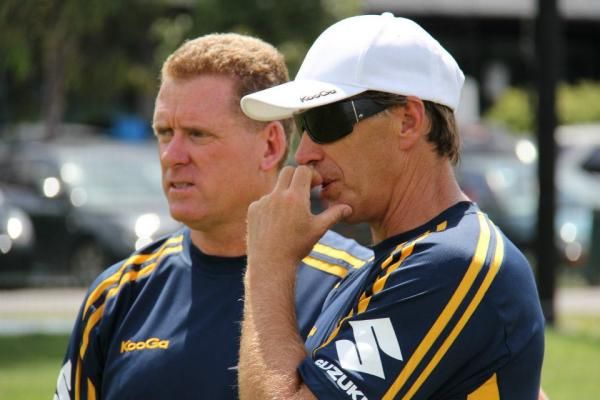 GreenEdge general manager Shayne Bannan talks tactics with Melbourne Storm rugby league coach, Craig Bellamy
