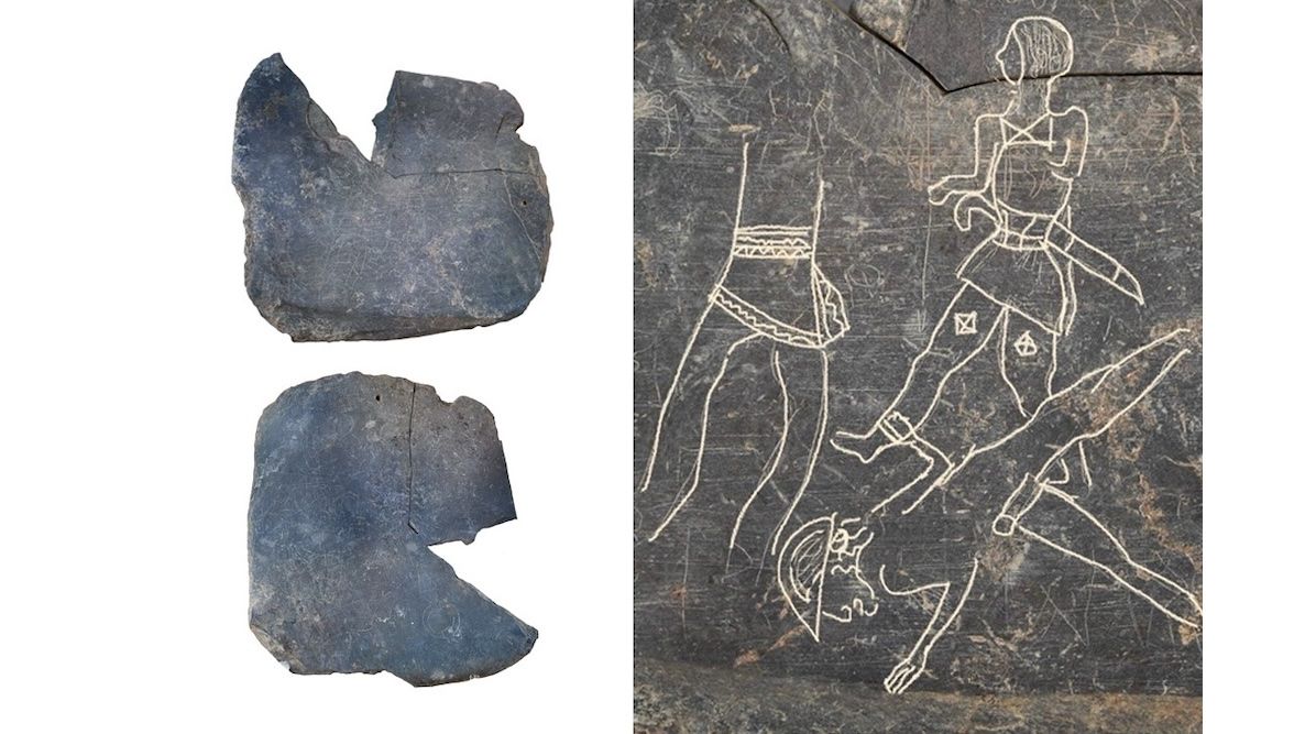 An ancient tablet carved with drawings of warriors. 