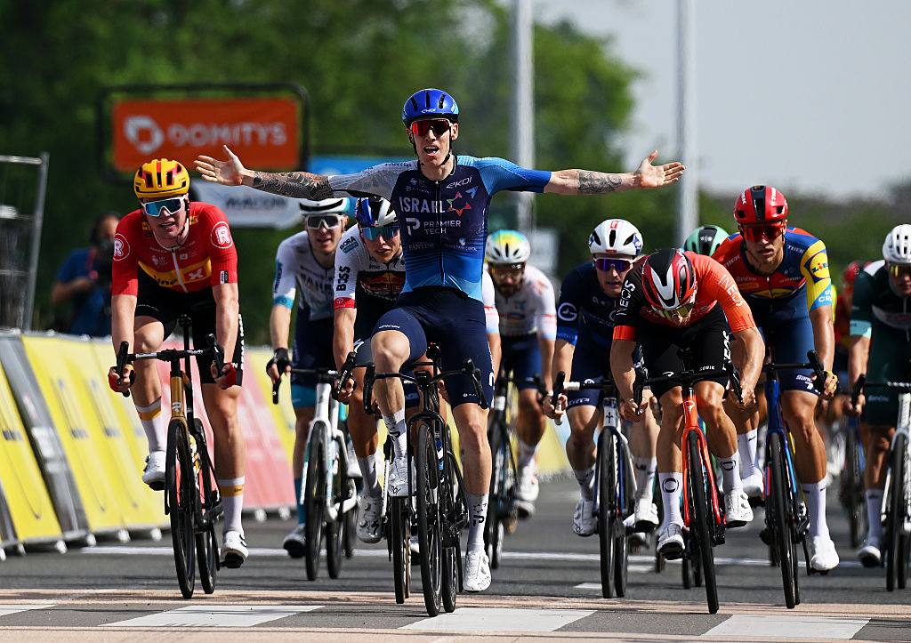 MACON, FRANCE - JUNE 12: Jake Stewart of Great Britain and Team Israel - Premier Tech celebrates at finish line as stage winner ahead of Axel Laurance of France and Team INEOS Grenadiers, Laurence Pithie of New Zealand and Team Red Bull - BORA - hansgrohe, Soren Waerenskjold of Norway and Team Uno-X Mobility, Jonathan Milan of Italy and Team Lidl - Trek and Paul Penhoet of France and Team Groupama - FDJ during the 77th Criterium du Dauphine 2025, Stage 5 a 183km stage from Saint-Priest to Macon / #UCIWT / on June 12, 2025 in Macon, France. (Photo by Dario Belingheri/Getty Images)