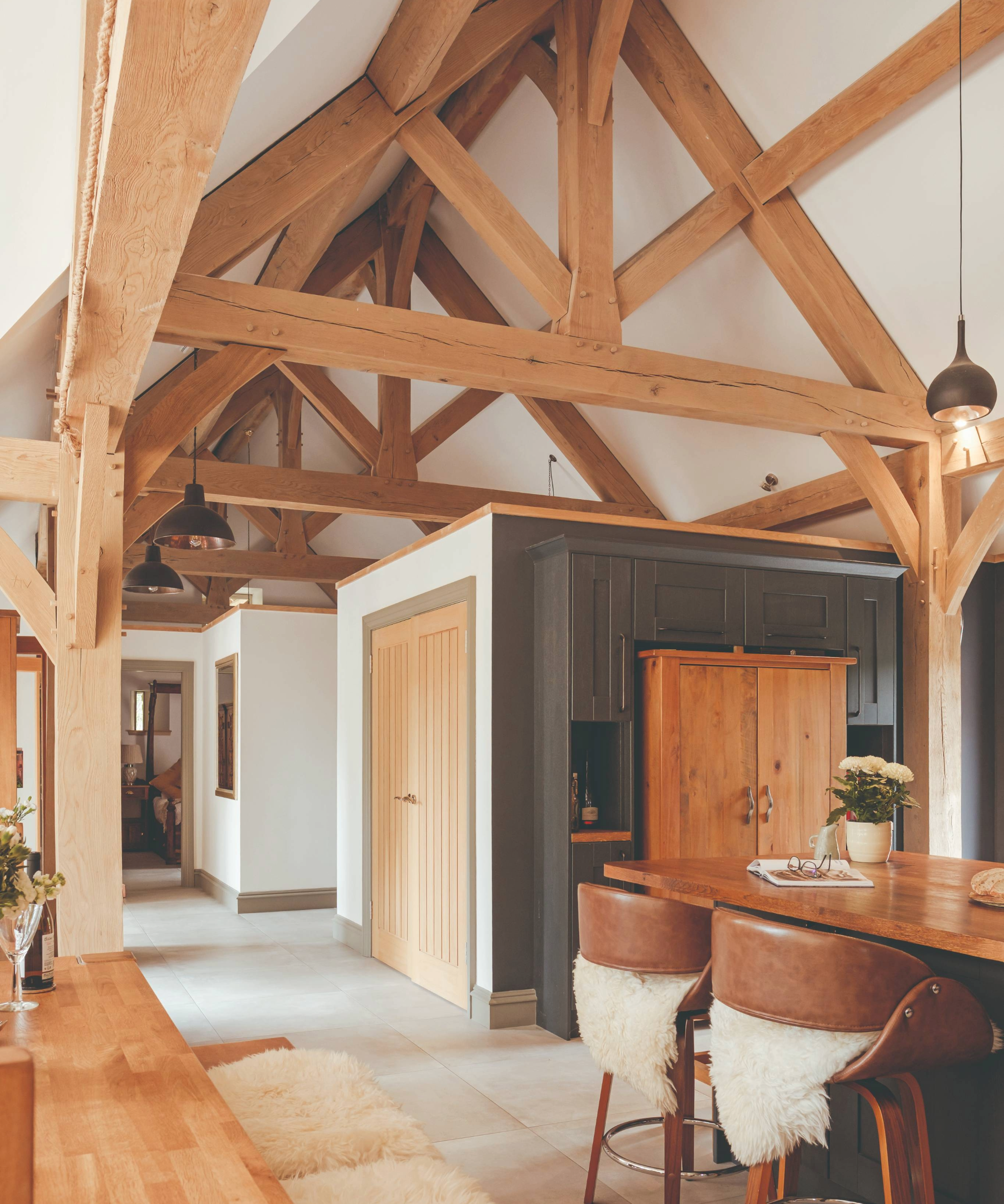 Inside the open plan kitchen diner area, with a view onto the connecting hallway