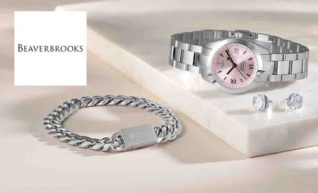 beaverbrooks logo top left with a close up shot of sliver jewellery and watches