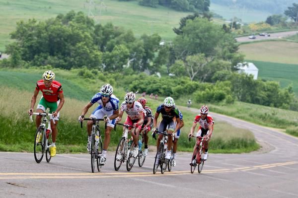 The leaders on the last KOM and getting closer to town.