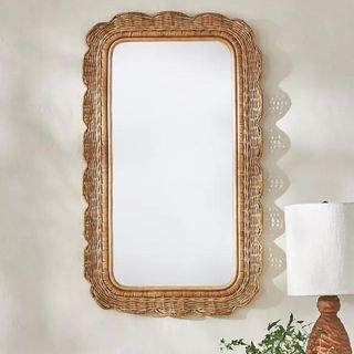 A mirror with a rattan frame from Anthropologie