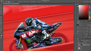 A screenshot of a superbike image in Photoshop, with a red layer mask overlay applied