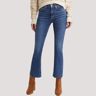 flat lay image of blue bootcut jeans