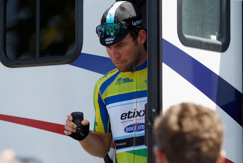 Mark Cavendish (Etixx-Quick Step) makes sure he has his Garmin for the stage