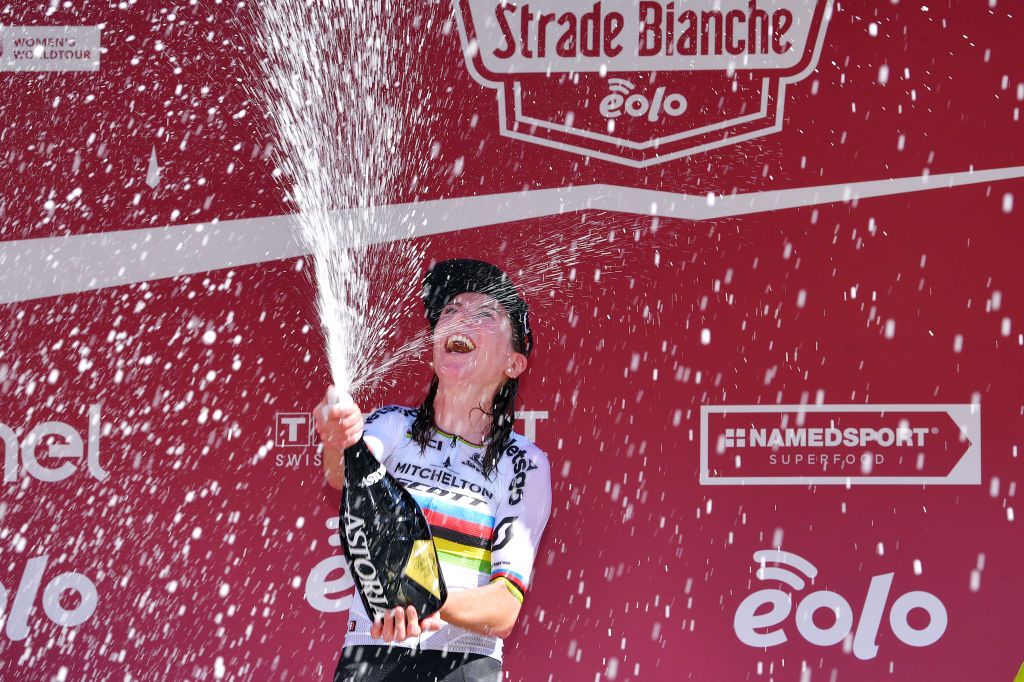SIENA ITALY AUGUST 01 Podium Annemiek Van Vleuten of The Netherlands and Team Mitchelton Scott World Champion Jersey Celebration Champagne Trophy during the Eroica 6th Strade Bianche 2020 Women Elite a 136km race from Siena to Siena Piazza del Campo StradeBianche on August 01 2020 in Siena Italy Photo by Luc ClaessenGetty Images