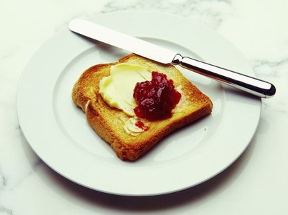 white toast with butter and jam